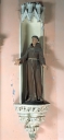 Statue dans une niche : saint François d'Assise