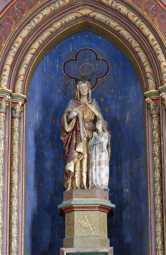 Statue couronnée sur socle : Education de la Vierge