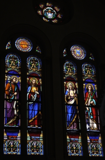 Ensemble des 13 verrières à personnages : Saint Joseph, Sacré Coeur de Jésus, Sacré Coeur de Marie, saint Symphorien, Donation du Rosaire à saint Dominique, Scènes de la vie de saint Pierre