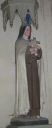 Statue sur socle : sainte Thérèse de l'Enfant-Jésus