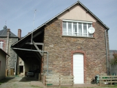 Entrepôt commercial puis salle des fêtes actuellement maisons, 5 et 9 place de l'Eglise (Nouvoitou)