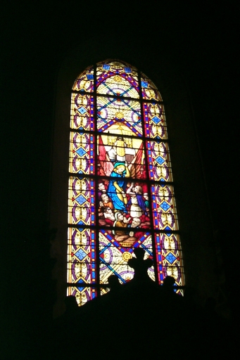 Verrière à personnages de la baie 12 : La rédemption par l'Eucharistie