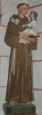 Statue sur socle : saint Antoine de Padoue et l'Enfant