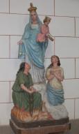 Groupe sculpté sur culot : Vierge à l'Enfant avec les Ames du Purgatoire